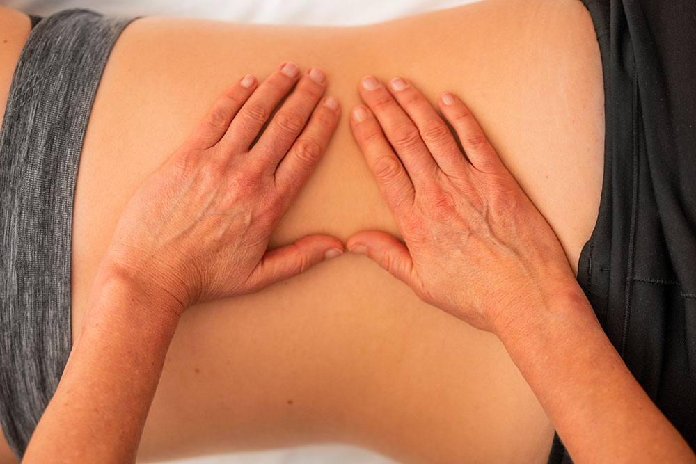 Rosen Method Bodywork - Hands Massaging a Back